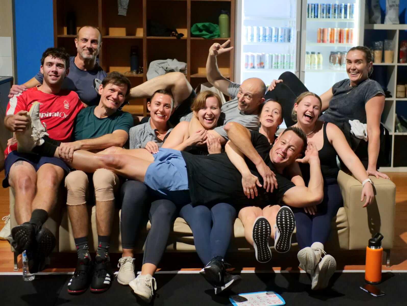 Members piled onto the couch after a class