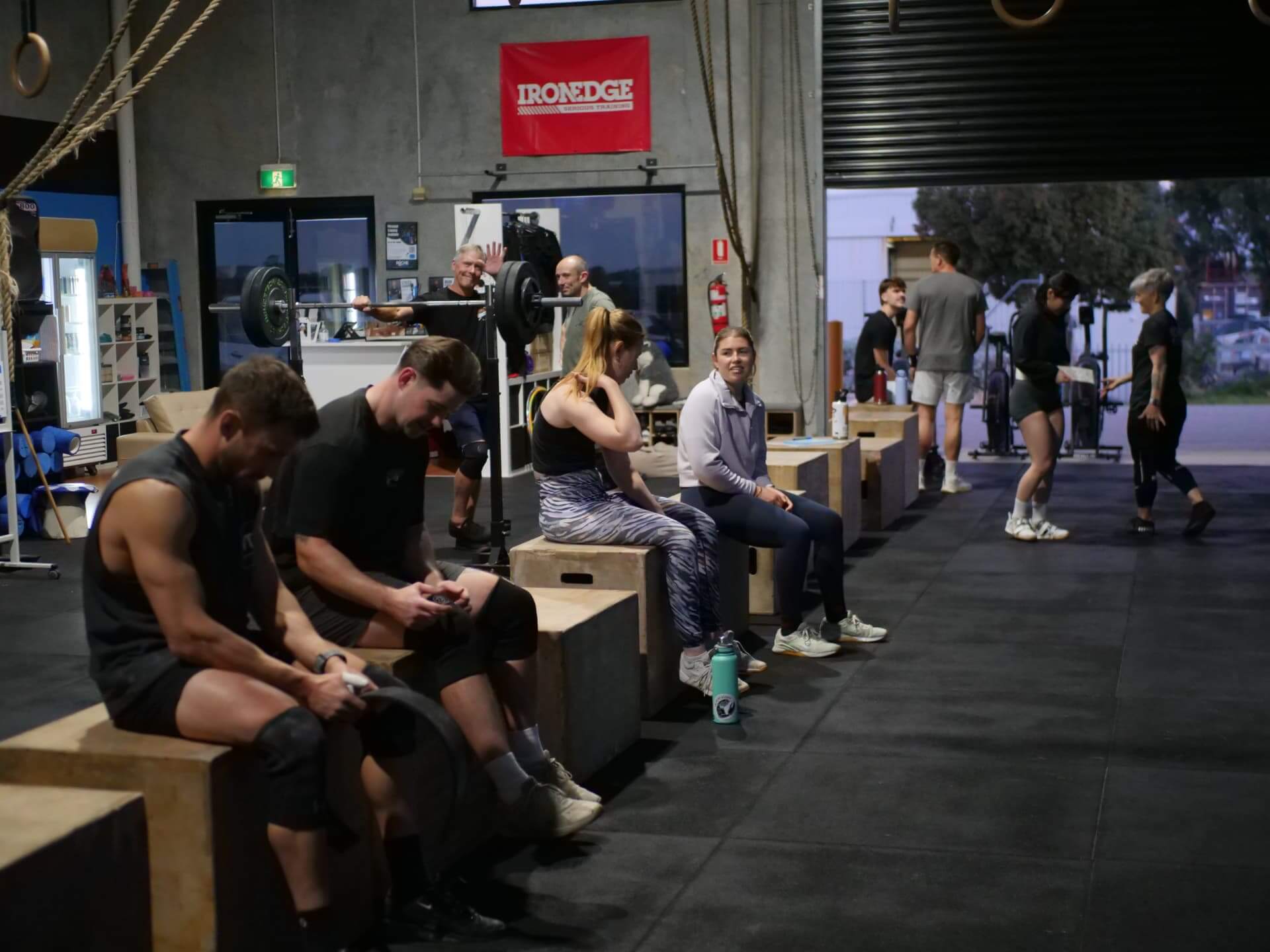 Members chatting between sets before a class