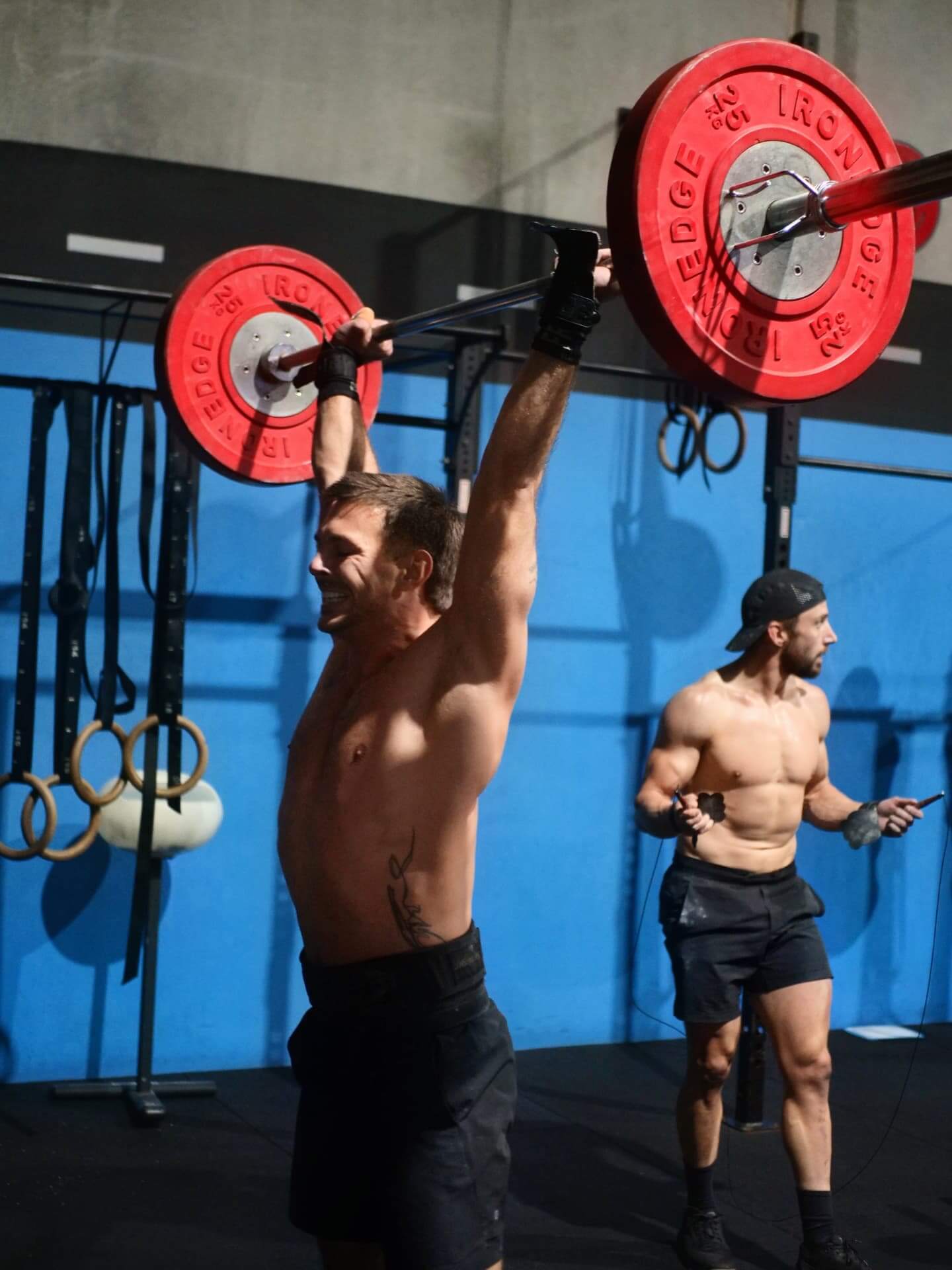 Member locking out a jerk overhead